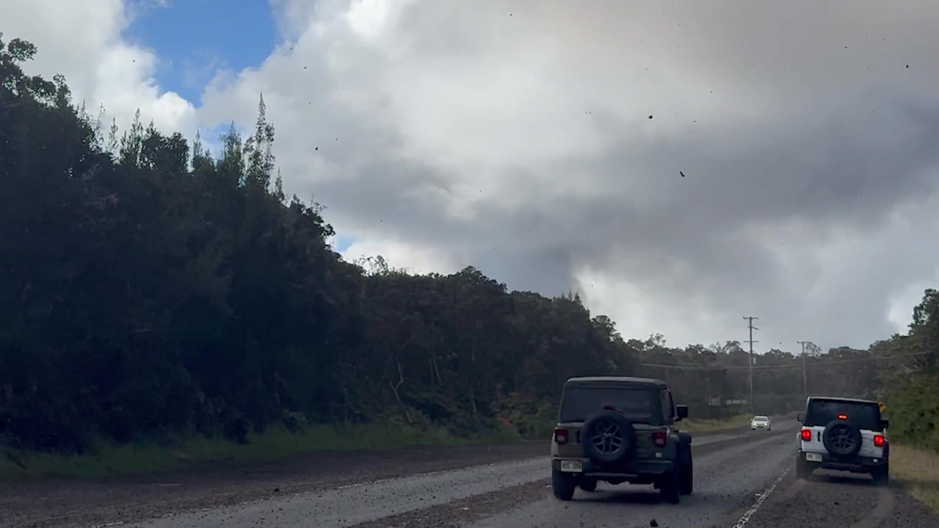 Huge rocks, Tephra, falls on motorist during massive volcanic eruption